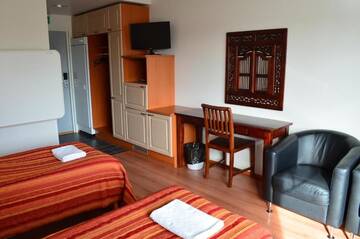 Фото номера Трехместный номер Отель Hotel Reima Country Center г. Jämijärvi 9